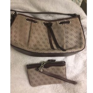 Dooney & Bourke tan with brown bag with wristlet.